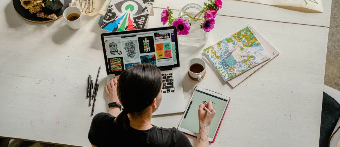 Woman drawing on computer making content